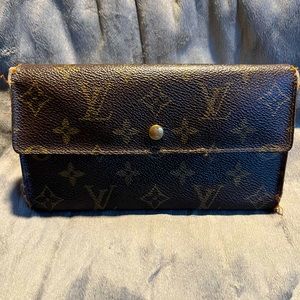 Vintage Louis Vuitton long wallet.